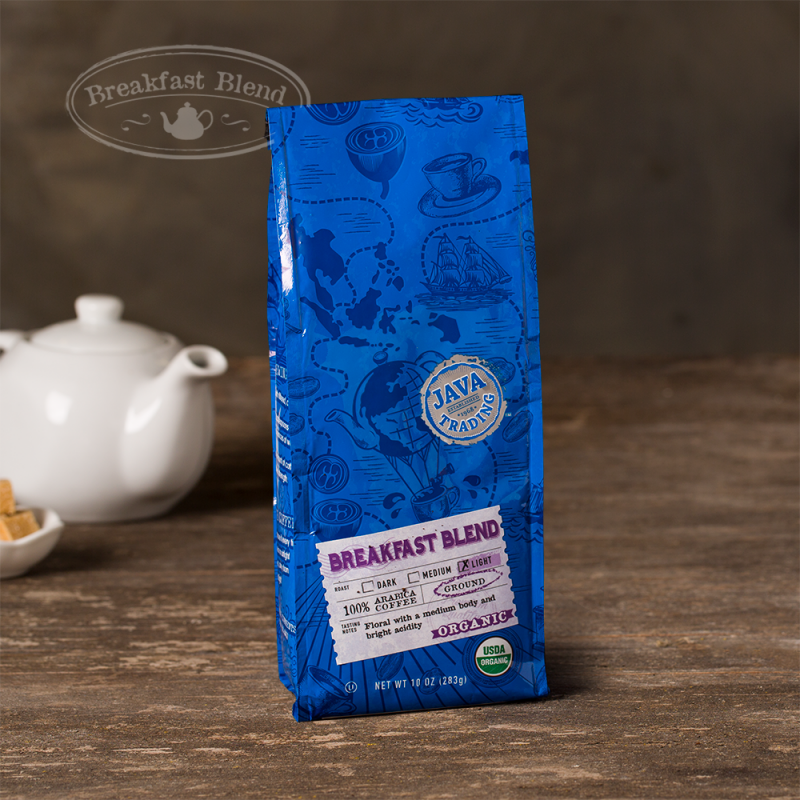 Bag of 10 ounce of Organic Breakfast Blend coffee on a wooden table