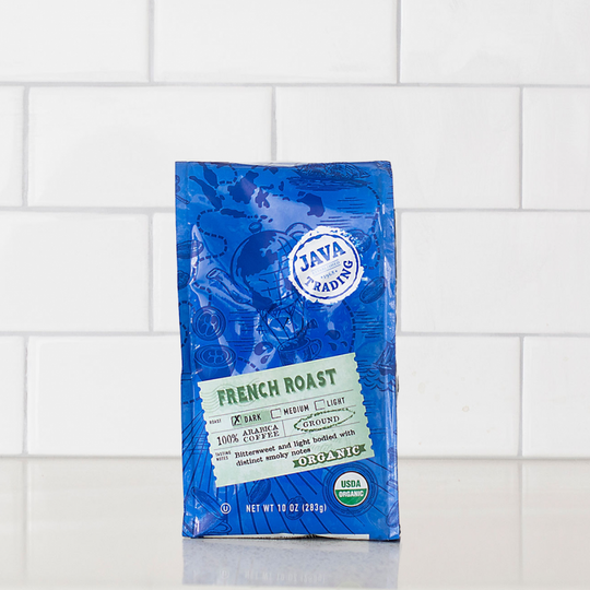 Bag of 10 ounce Organic French Roast on a kitchen counter